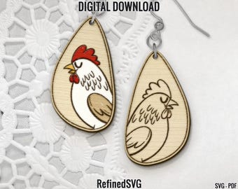May include: Two wooden earrings with a laser-cut design of a chicken. The earrings are in the shape of a teardrop and are a light brown color. The chicken design is in a light brown color with a red comb and wattle.