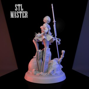 May include: A white 3D printed figurine of a female character with short hair, wearing a short skirt and holding a sword. The figurine is standing on a rocky base.
