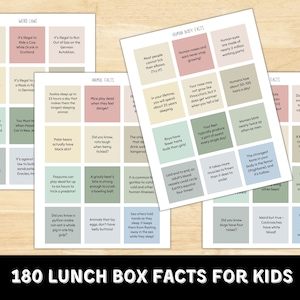 May include: A set of 180 colorful cards with fun facts for kids about animals, human body, and weird laws. The cards are arranged in a grid pattern on a wooden background. The text on the cards is in black and white.