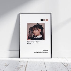 May include: A black and white poster featuring a photograph of a woman wearing a black lace glove and a black bow in her hair. The text on the poster reads "Schwarzes Herz" and "Ayliva". The release date is 25 August 2023.