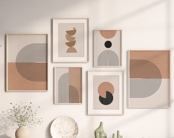 May include: A light wood console table with two shelves, featuring geometric print artwork in brown, black and white. The table is decorated with a vase of white flowers, two green ceramic vases and a round white plate.