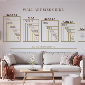 May include: A wall art size guide with different ratios and measurements in inches and centimeters. The guide includes standard sizes for wall art, such as 11x14, 12x15, 16x20, 18x24, 20x30, and 24x36. The guide also includes a standard sofa size of 90 inches or 228.6 centimeters.