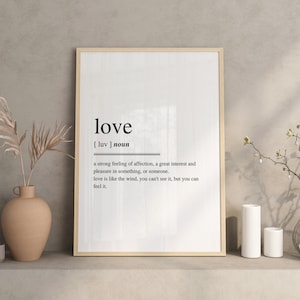 Puede incluir: Una impresión de arte de pared imprimible en blanco y negro con la palabra "love" definida como un fuerte sentimiento de afecto, un gran interés y placer en algo o alguien. El texto dice "el amor es como el viento, no se puede ver, pero se puede sentir."