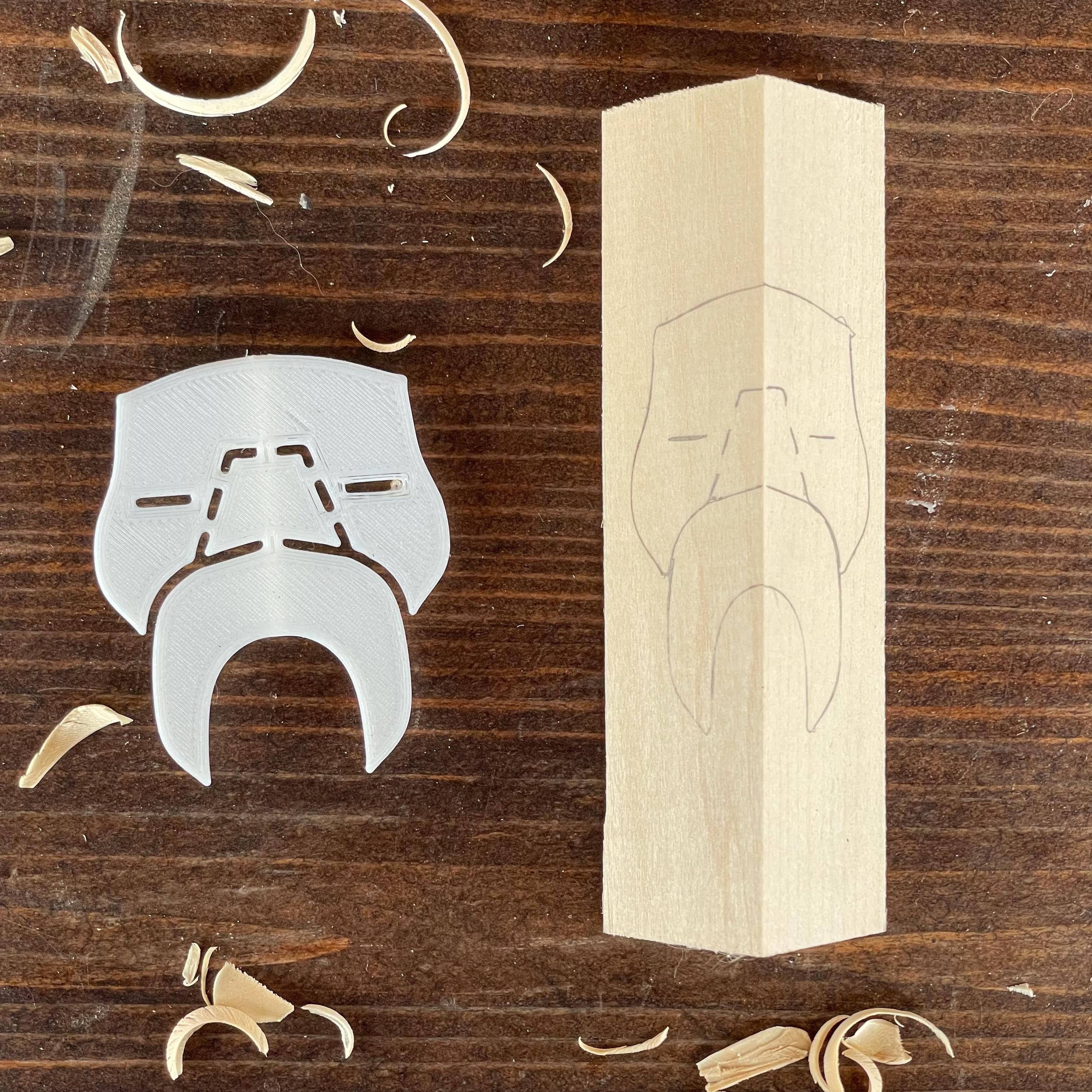 3D-printed caricature stencil for wood.