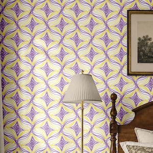 May include: Wallpaper featuring a repeating geometric pattern of interlocking purple and yellow scribbled diamond shapes on a white background. The design creates a continuous grid of curved lines and star-like motifs across the wall surface.