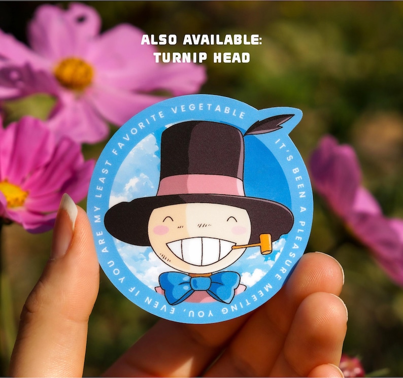 May include: A blue and white sticker with a cartoon character wearing a black top hat and a blue bow tie. The text on the sticker reads "You are my least favorite vegetable. It's been a pleasure meeting you, even if..." and "Also available: Turnip Head".