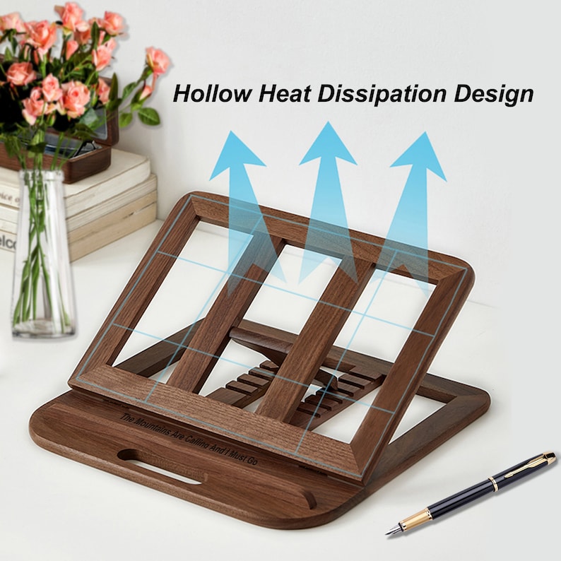 May include: A wooden book stand with a hollow design for heat dissipation. The stand is angled to hold a book or tablet at a comfortable reading position. The stand has a handle and a quote engraved on the base: "The Mountains Are Calling And I Must Go."