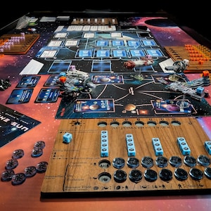 May include: A game board with a space theme, featuring a wooden automation track with dice and tokens. The board game is called "Beyond the Sun".