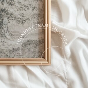 May include: A gold-coloured framed print displaying a monochrome sketch of a landscape with trees and foliage. The frame has a simple, elegant design. The text "MIDNIGHT FRAME MOCKUPS" is overlaid on the image.