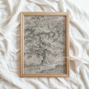 May include: A framed monochrome print depicting a large tree with intricate leaves. The artwork is encased in a gold-coloured rectangular frame. The background is a white, textured fabric.