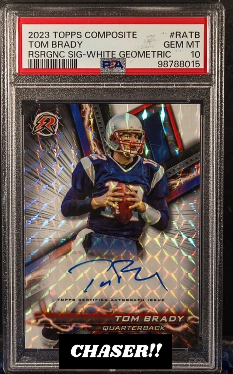 May include: A Tom Brady football card from the 2023 Topps Composite series, featuring an autograph. The card is graded GEM MT 10. The card has a geometric design with the text "CHASER!!" at the bottom.