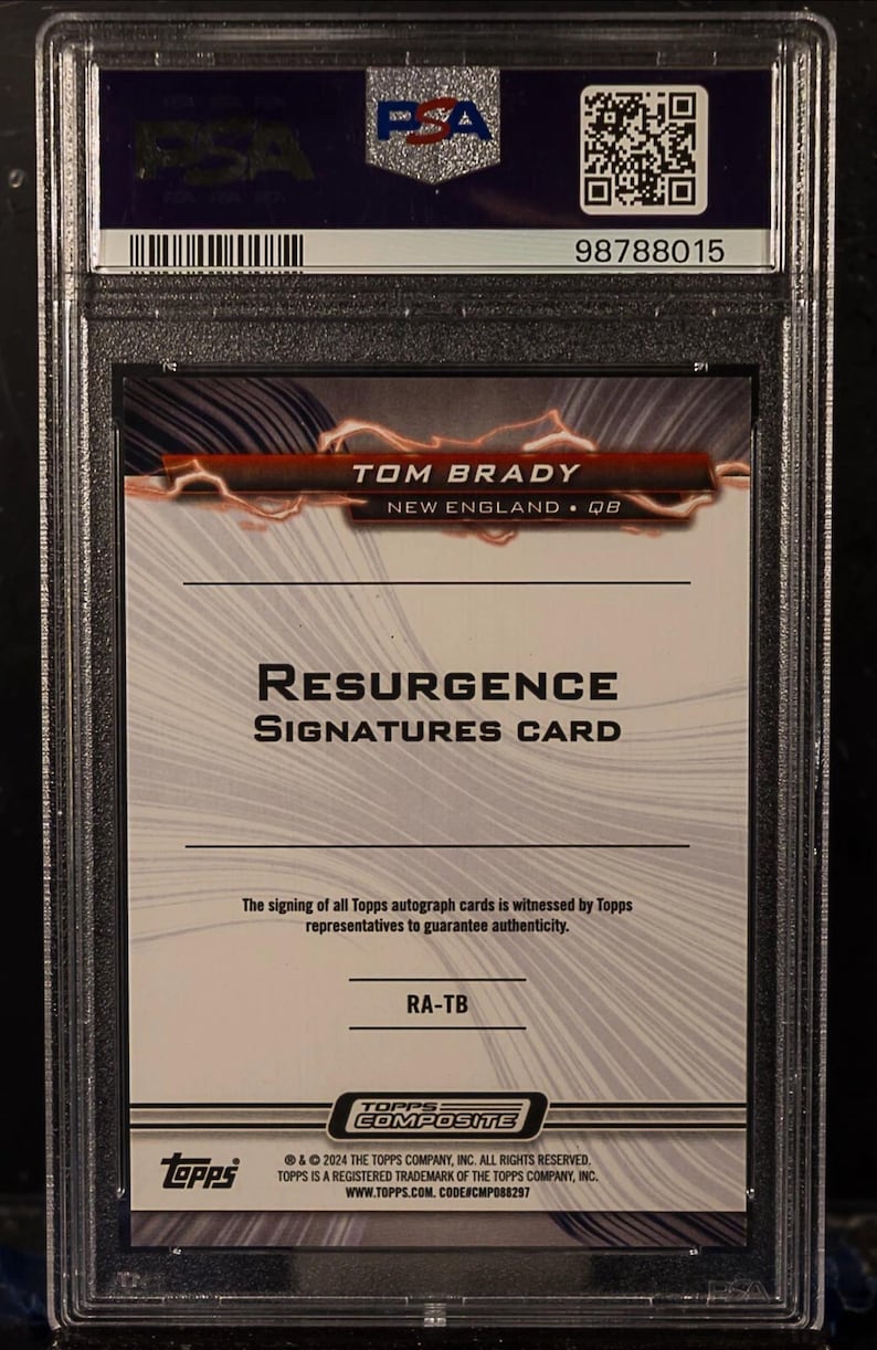 May include: A Tom Brady "Resurgence Signatures Card" in a protective case. The card features the player's name, team, and position. The card is from the Topps Composite series and is authenticated by PSA.