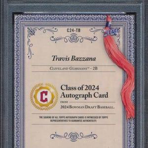 May include: A graded baseball card featuring Travis Bazzana of the Cleveland Guardians. The card is from the 2024 Bowman Draft Baseball series and includes an autograph. The card is encased in a PSA holder with a serial number.