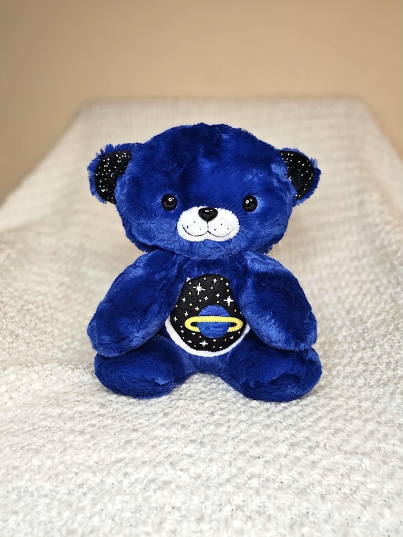 Ollie the Outer Space Otter Weighted Plushie Stuffed Animal