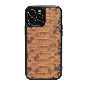 May include: A brown snakeskin iPhone case with a black border. The case has a textured pattern and a raised camera bump.