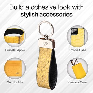May include: A set of yellow leather accessories with a snakeskin pattern. The set includes a keychain, a phone case, a card holder, a bracelet, and a glasses case.