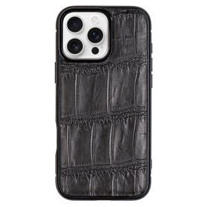 May include: Black leather phone case with a crocodile pattern.