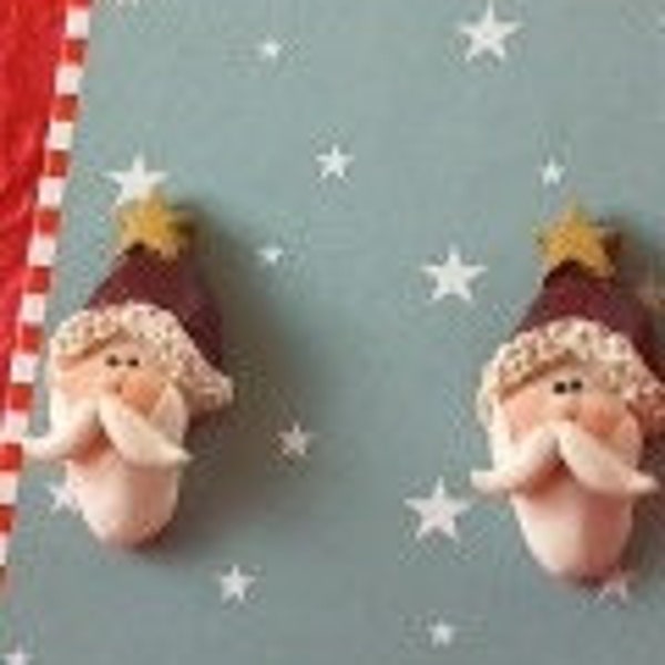 Tiny Santa Claus head earrings with handle bar mustache and yellow star on fur lined hat post earrings black and white Christmas Xmas