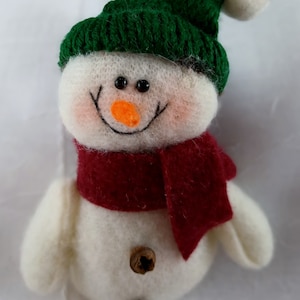 Plush soft snowmen pins with green knit cap, red stocking hat, red plaid cap multi color cap soft carrot nose red scarf green scarf comical