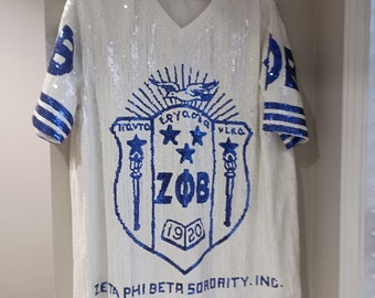 Zeta Phi Beta pailletten blauwe en witte jersey jurk