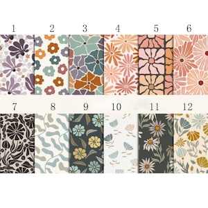 May include: Twelve different floral patterns in a grid layout. Each pattern features a different color scheme and floral design. The patterns are numbered 1 through 12.