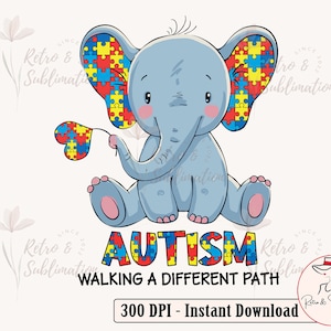 Puede incluir: Un elefante azul con orejas de piezas de rompecabezas sostiene un corazón de pieza de rompecabezas. El texto "AUTISM WALKING A DIFFERENT PATH" está debajo del elefante.