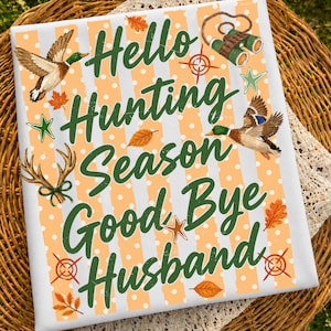 May include: A white fabric square featuring vertical orange stripes with white polka dots. The text reads Hello Hunting Season Good Bye Husband in dark green. Illustrations include two flying mallard ducks, binoculars, antlers, and orange leaves.