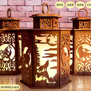 May include: Three wooden lanterns with intricate designs featuring wolves and a moon. The lanterns are made of dark brown wood and have a light brown interior. The designs are cut out of the wood, creating a shadow effect when lit. The lanterns are perfect for adding a rustic and whimsical touch to any home.