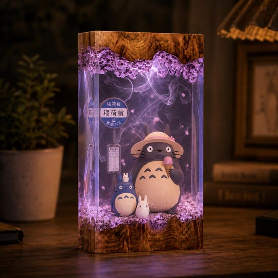 Same enchanting Totoro-in-resin diorama concept at a much more accessible price point — a genuinely hand-crafted glow-up for any Ghibli fan's shelf.