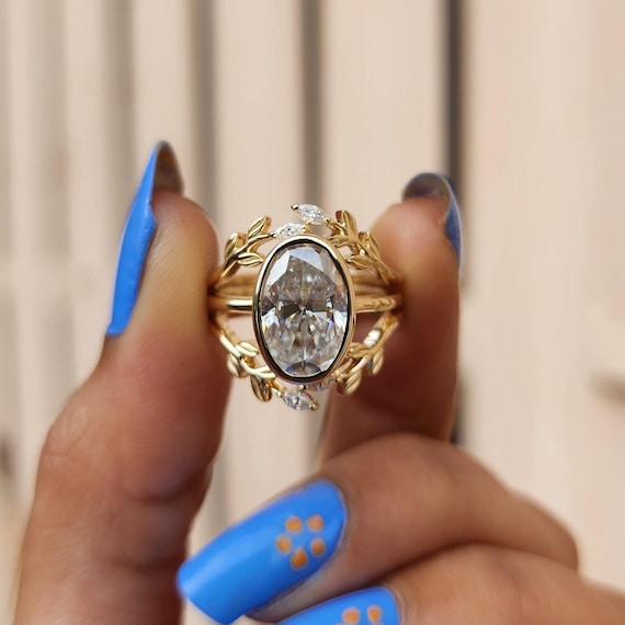 Nature Inspired Oval Moissanite Engagement Ring Gold Leaf Enhancer Band Unique Oval Cut Wedding Ring Vintage Bridal Ring Anniversary Gift