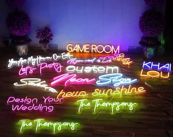 May include: A collection of neon signs with various phrases and designs, including "Game Room", "Let's Party", "Custom Neon", "Hello Sunshine", "The Thompsons", and "Khai Lou".