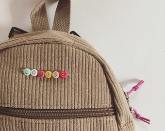 Zippered velvet nursery backpack with personalized word or first name in colored beads / Little BACKPACK COLORFUL