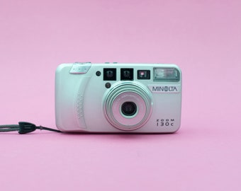 Minolta Zoom 130c appareil photo à zoom analogique pour film 35 mm avec de grandes capacités de zoom | En très bon état | Garantie de 30 jours