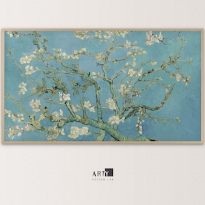 May include: A painting of a blooming almond tree with white blossoms against a blue sky. The branches of the tree are depicted in a stylized, expressive manner, characteristic of the artist's style. The painting is framed in a simple wooden frame.