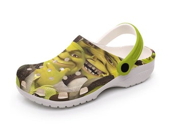 Bring out the Ogre in you - and dress like one too! With Shrek Crocs with  ears! Perfect for wearing around the house (or swamp) and out and…