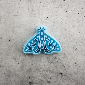 Embossed Moth