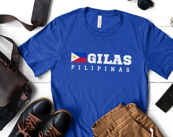 May include: A royal blue t-shirt with a white graphic of the Philippine flag and the text "GILAS PILIPINAS".