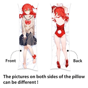 May include: A long pillow with a red-haired anime character wearing a school uniform on the front and a red-haired anime character wearing a red bunny costume on the back.