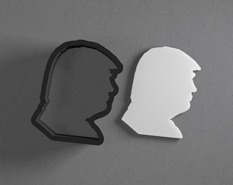 Kolczyki z gliny polimerowej i foremka do ciastek z wizerunkiem prezydenta Donalda Trumpa, narzędzie do ceramiki