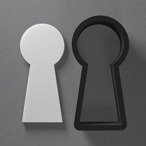 Orecchino in pasta polimerica a forma di buco della serratura e tagliabiscotti, strumento per ceramica