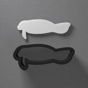 Boucle d'oreille et emporte-pièce lamantin en argile polymère, outil de poterie