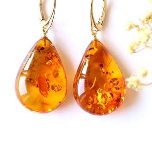 Massive golden amber earrings teardrop amber earrings natural Baltic amber jewelry cognac dangle amber earrings gold color gemstone earrings