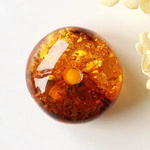 Massive cognac color Baltic amber donut pendant, large orange amber pendant doughnut shape, round amber pendant with hole, amber stone