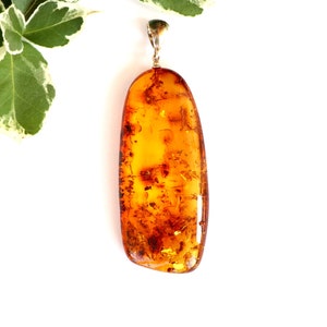 Cognac amber pendant, gold color long amber pendant, natural Baltic amber, amber pendant with glitters, amber with silver, amber gift