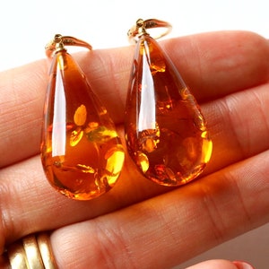 Very large dangle amber earrings, drop shape long orange amber earrings, unique massive earrings gift for mother, cognac shiny amber earring image 6