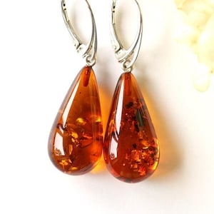 Long cognac amber earrings amber jewelry teardrop shape amber earrings massive drop earrings gold Baltic amber earrings golden gem earrings