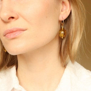 Green color oval shape amber earrings, natural baltic amber earrings with black grass inside, dangle organic resin amber jewelry for her