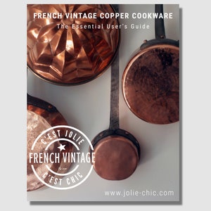 May include: A guide to using French vintage copper cookware. The cover features a close-up of copper pots and pans hanging on a wall. The text "C'EST JOLIE FRENCH VINTAGE C'EST CHIC" is in a circle with a star in the center. The website address "www.jolie-chic.com" is at the bottom of the image.