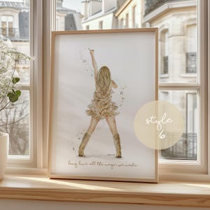 May include: Watercolor print in a wooden frame. The artwork depicts a singer on stage with long blonde hair, wearing a fringed dress and boots. The text "long live all the magic we made" is at the bottom.