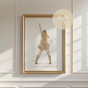 May include: Watercolor print of a woman in a gold dress and boots, singing into a microphone with her arm raised. The print is in a gold frame and includes the text "in a storm in my best dress, fearless."